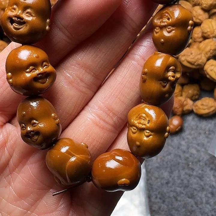橄榄核手串九**.我是你