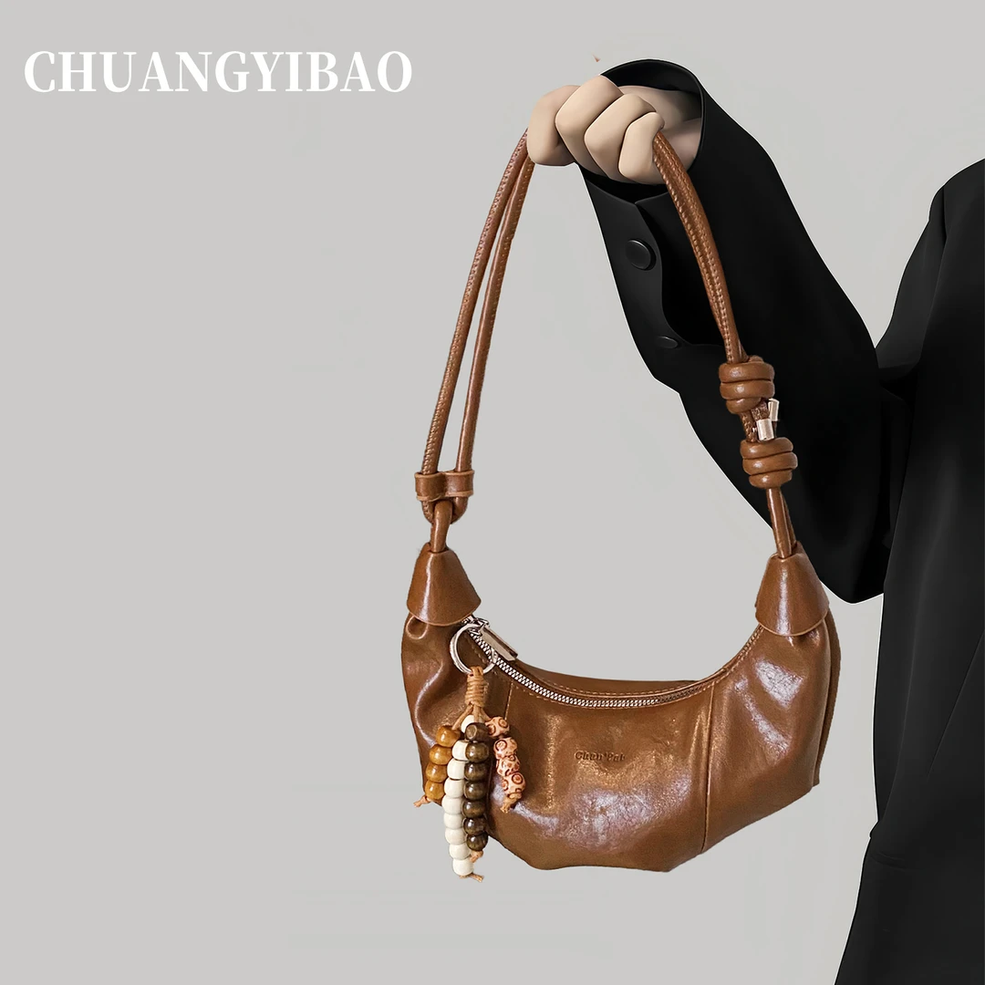 超火可颂牛角包包女式2025新款秋冬高级感小众休闲单肩斜挎饺子包