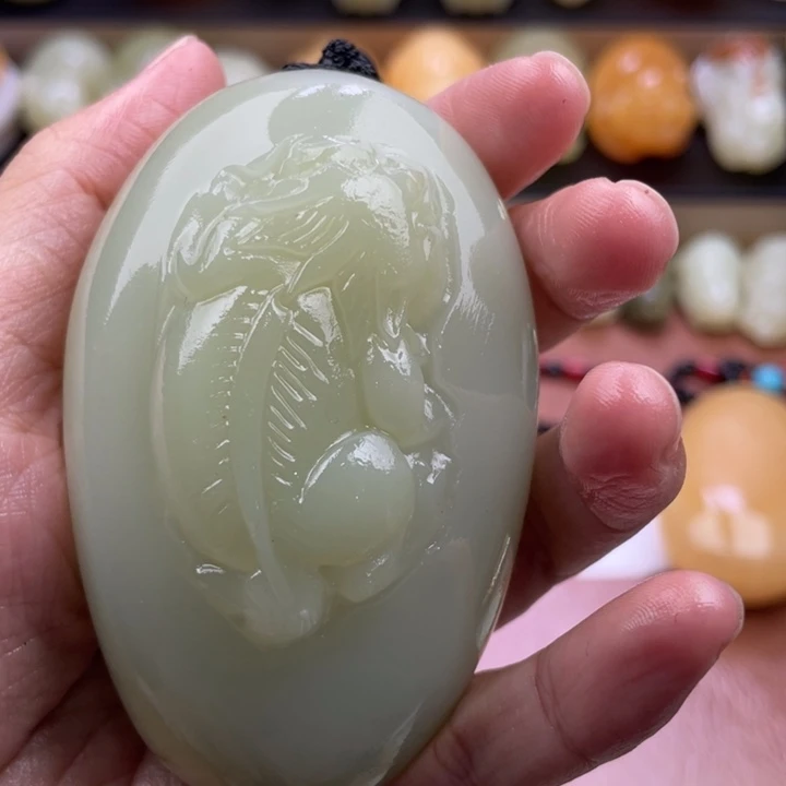 金***海石材古青石手把件