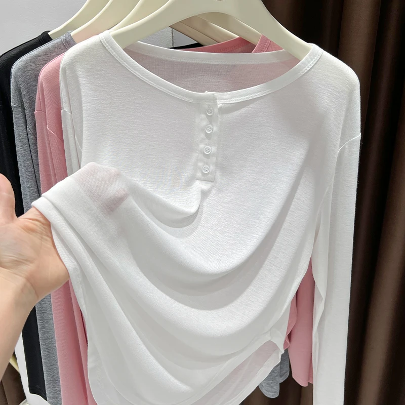 白色宽松纽扣圆领薄款罩衫夏季2025新款叠穿中长款微透长袖上衣女