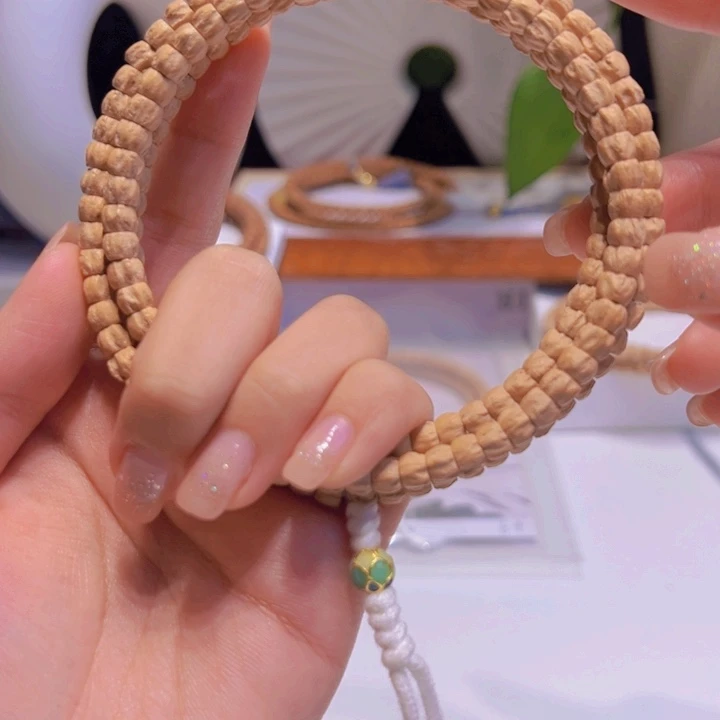 呜***啦柏香籽/百香籽吊坠