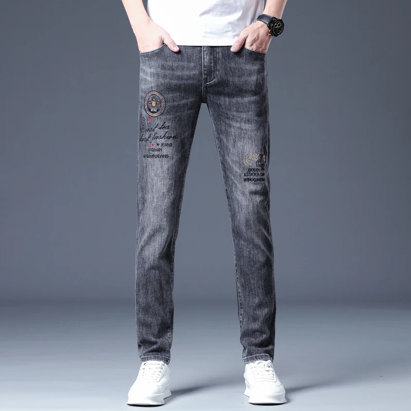 春夏季欧洲站轻奢刺绣牛仔裤男士修身潮牌痞帅弹力休闲烟灰色长裤
