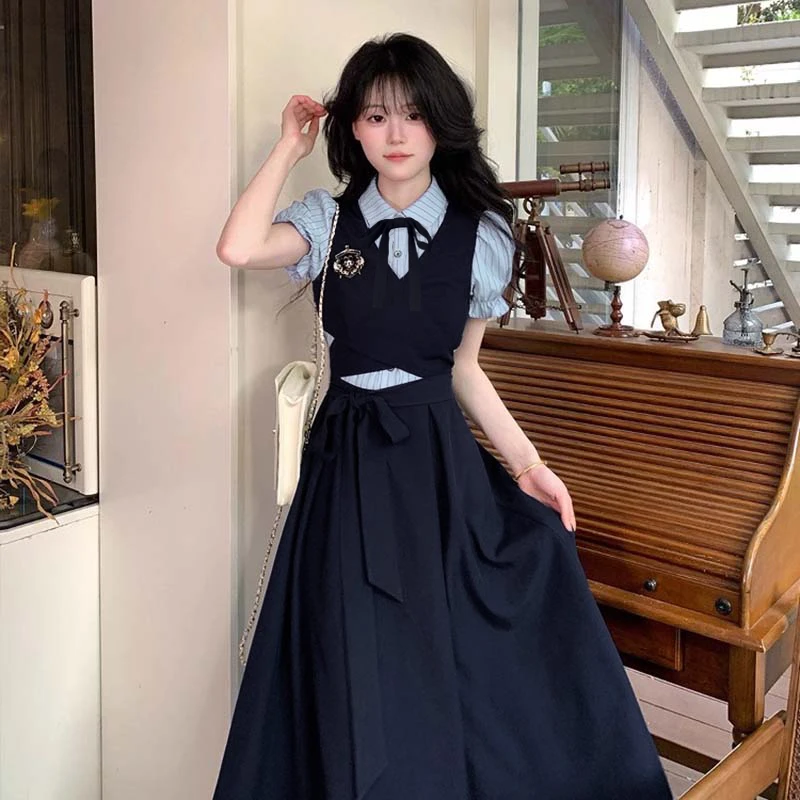 2025春秋新款英伦学院风拼接假两件收腰减龄气质长款连衣裙D3273