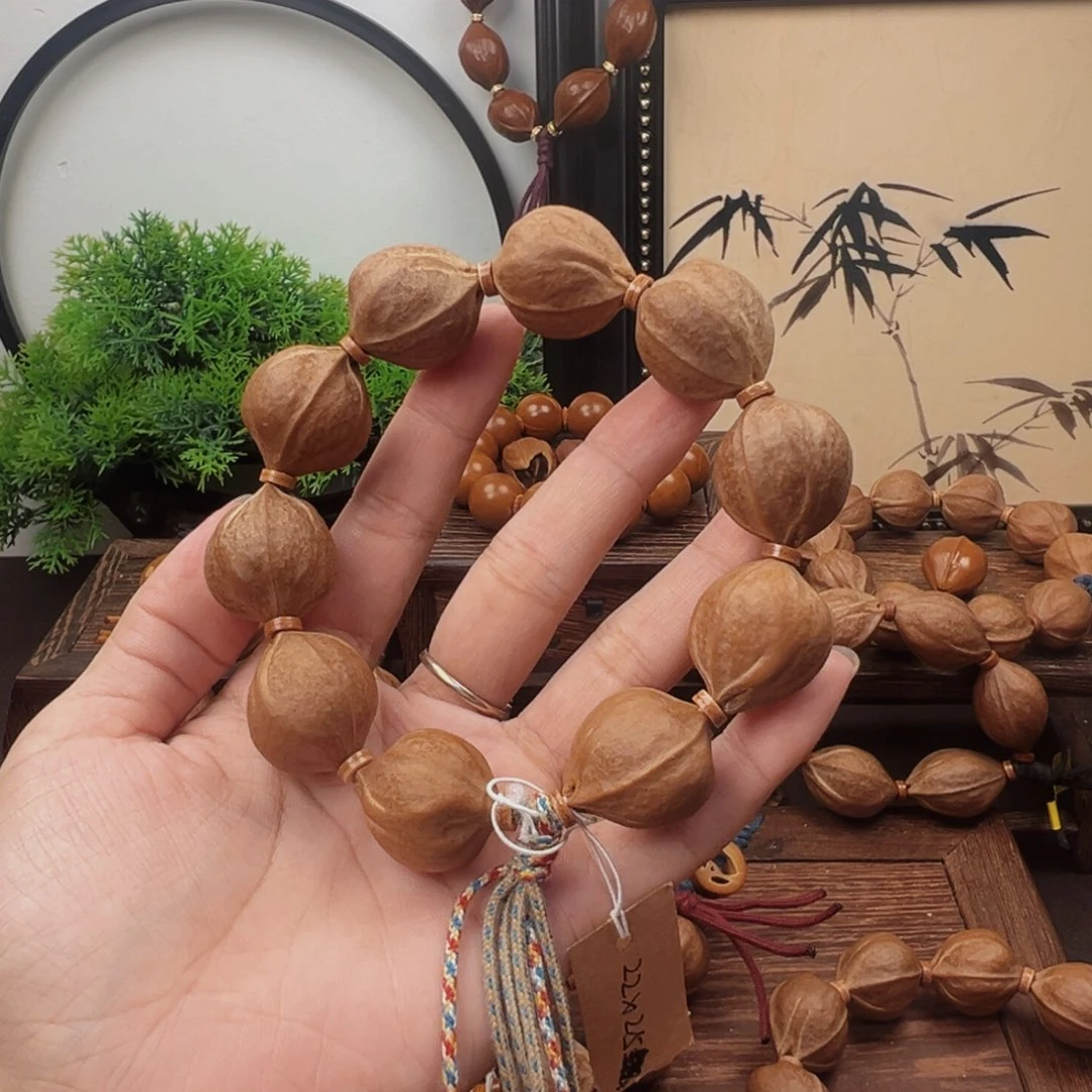 B***子手串橄榄核22.25梅林铁核