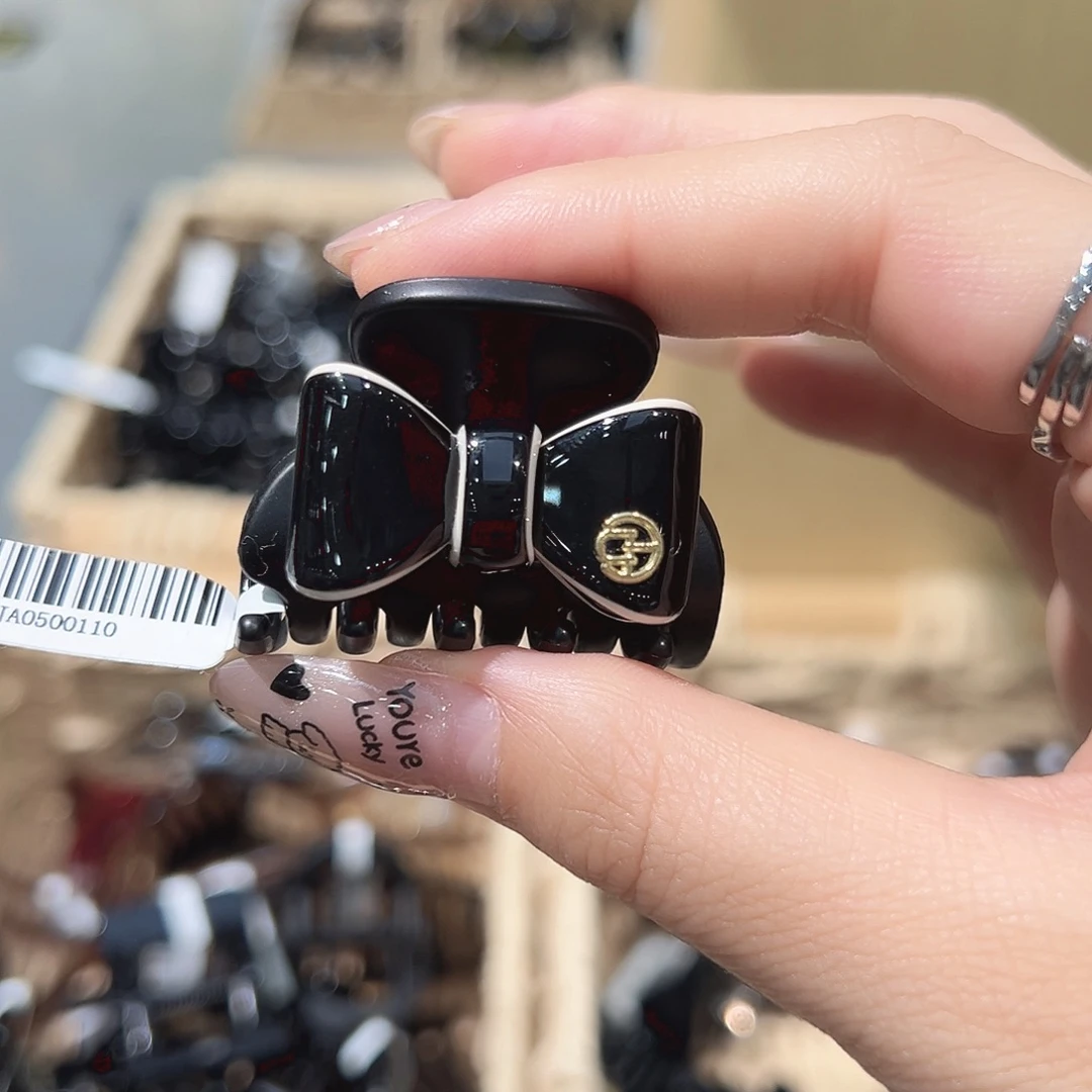 皮质铁合金黑色蝴蝶结马尾抓