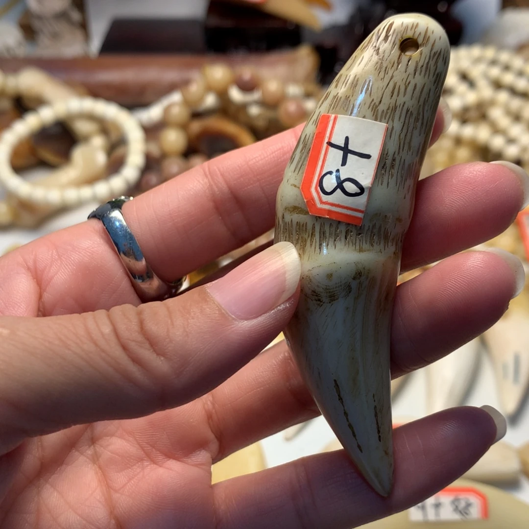 驼骨把件驼骨把件深色牙牙