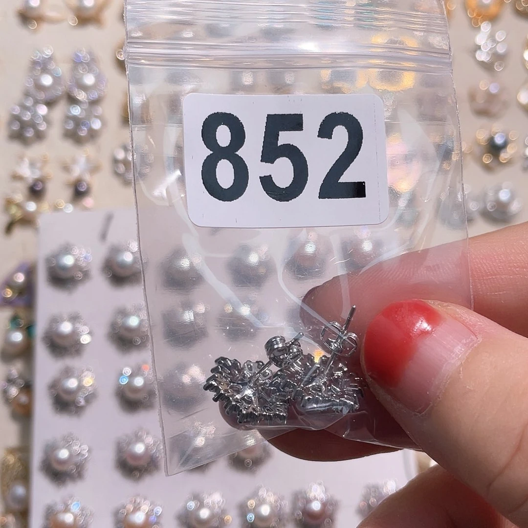 合金淡水珍珠耳饰摩***胥