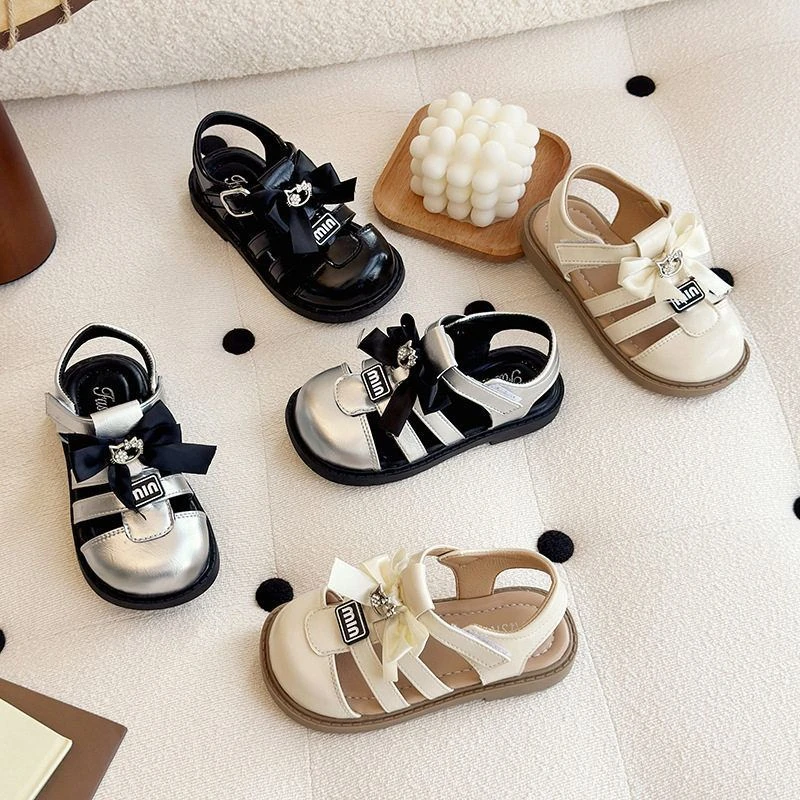 香风包头凉鞋蝴蝶结小2025镂空女童韩版夏季公主鞋水钻沙滩鞋新