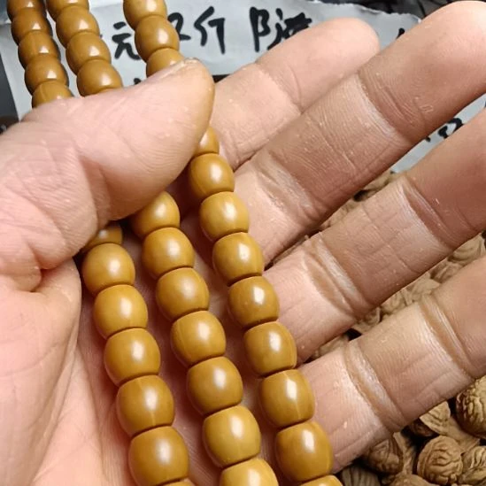 桃核吊坠猴头手串9+直切微微瑕