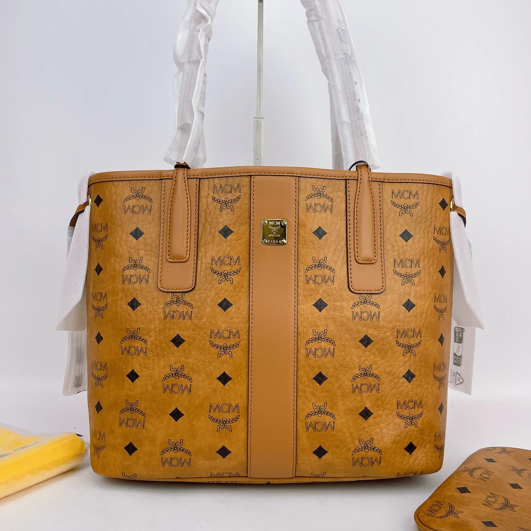 95新 MCM MCM 干邑色老花手提包底长30 J288