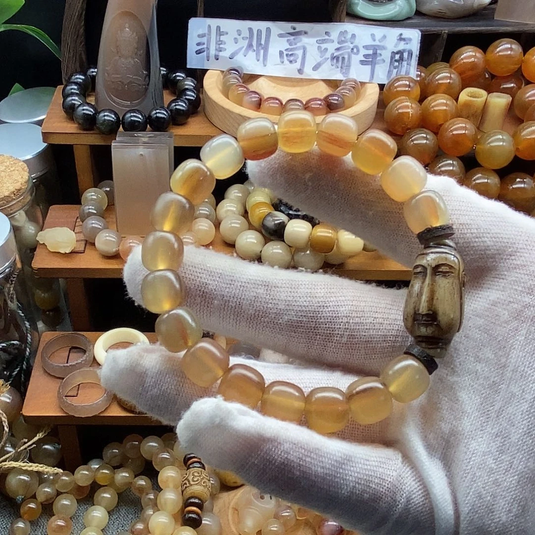 布艺非金属10x9mm老型珠非洲黑斑羊角手串