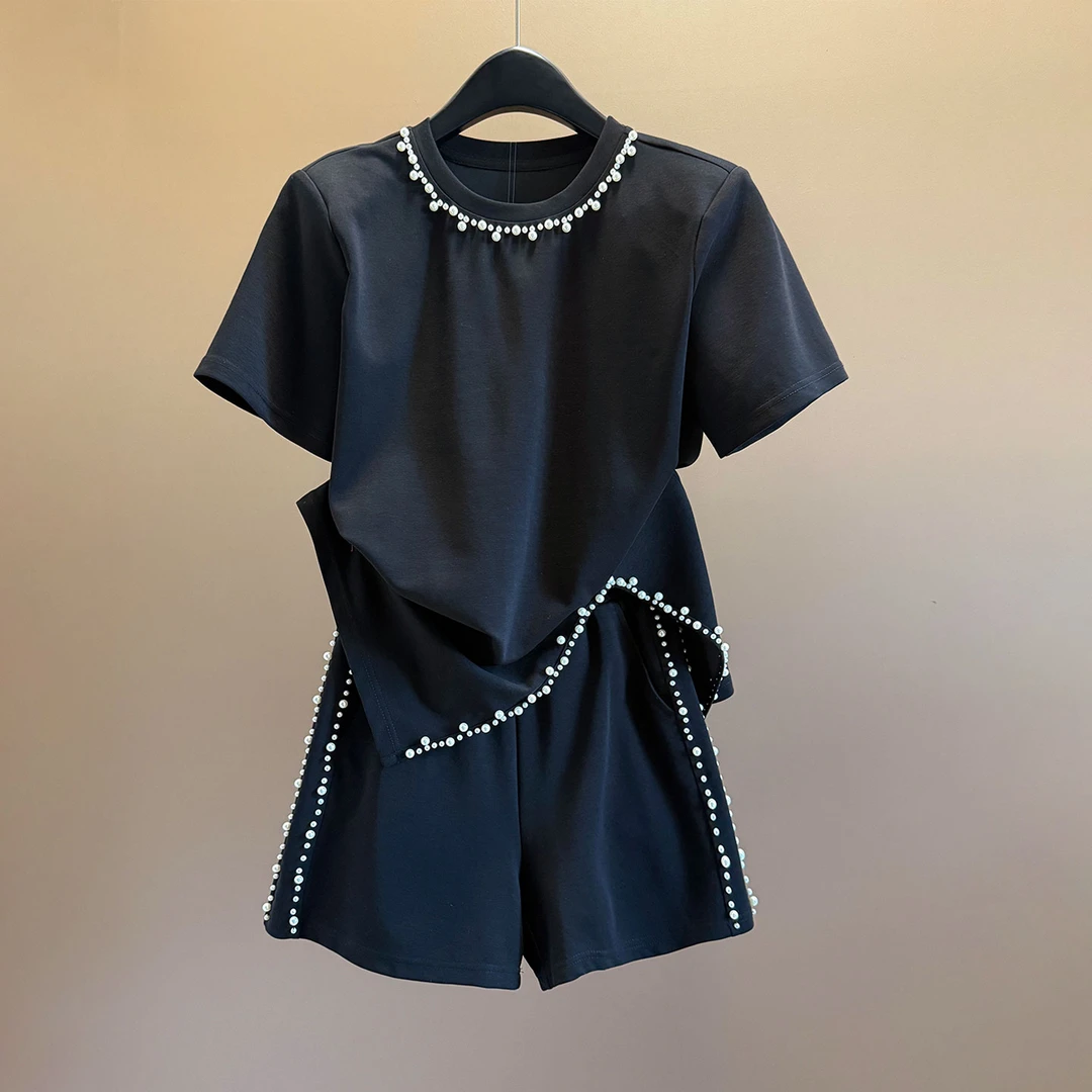气质温柔风时尚套装女夏圆领钉珠设计侧开叉不规则上衣短裤两件套
