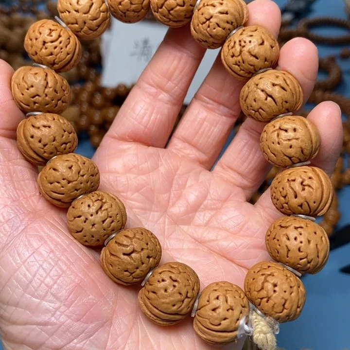 【闪购商品】桃核吊坠钮扣手持