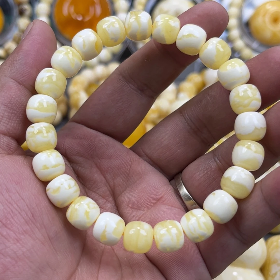 琥珀未镶嵌手串同料瓷白花老邢手串10mm