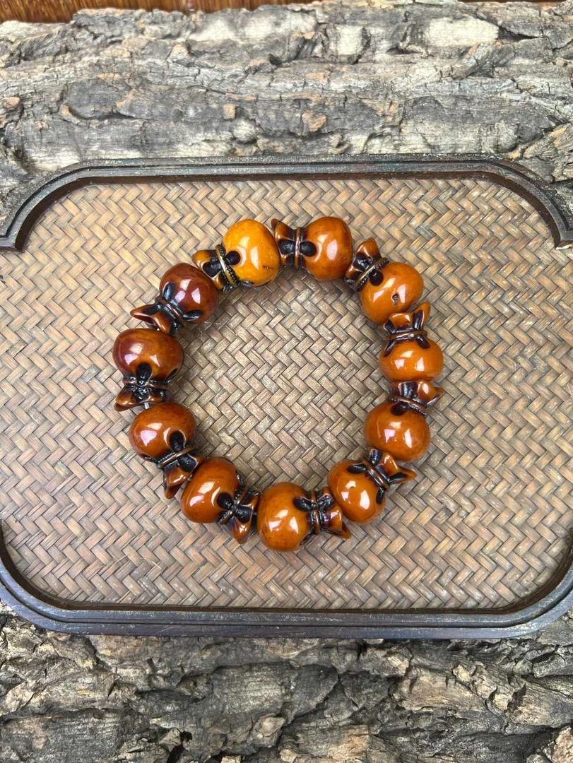 qd一念单圈经典钱袋串