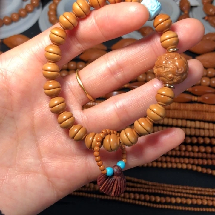 橄榄核手串/手链貔貅金饭碗