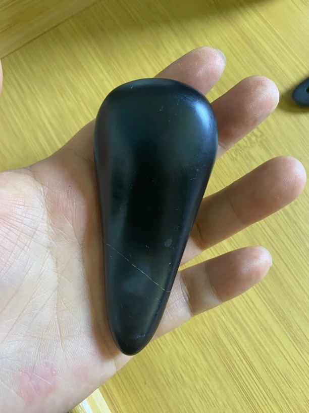 砭石点穴松筋棒按摩