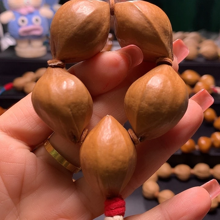 胡***橄榄核手串/手链三花手捻