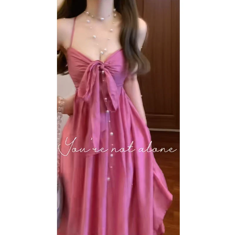 度假风蝴蝶结吊带连衣裙女夏季新款设计感收腰显瘦气质时尚长裙子