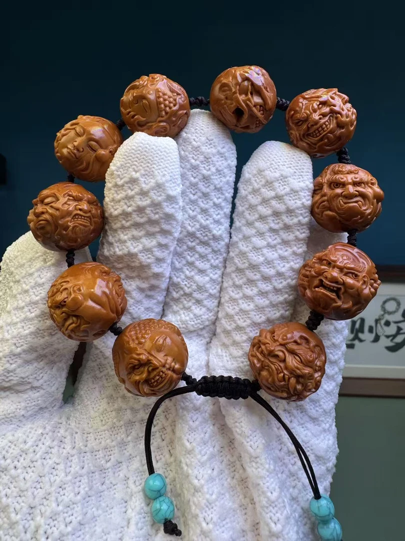 橄榄核雕四面恶僧男女适用文玩精品