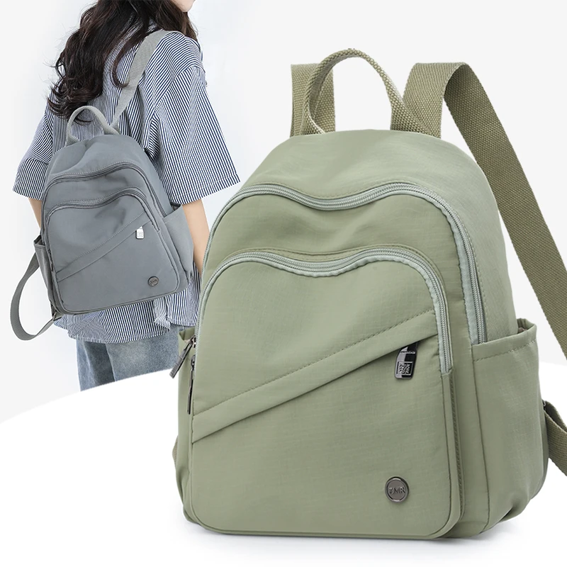 牛津布双肩包女2025新款时尚轻便防水小型高级感旅游帆布休闲背包