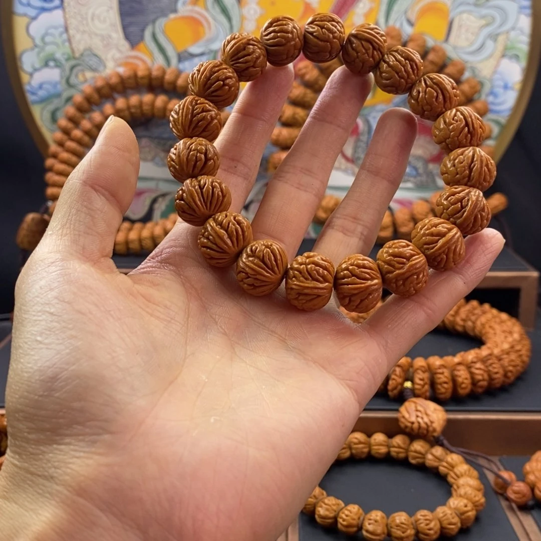 桃核手串好*龙纹桃核玉龙脊