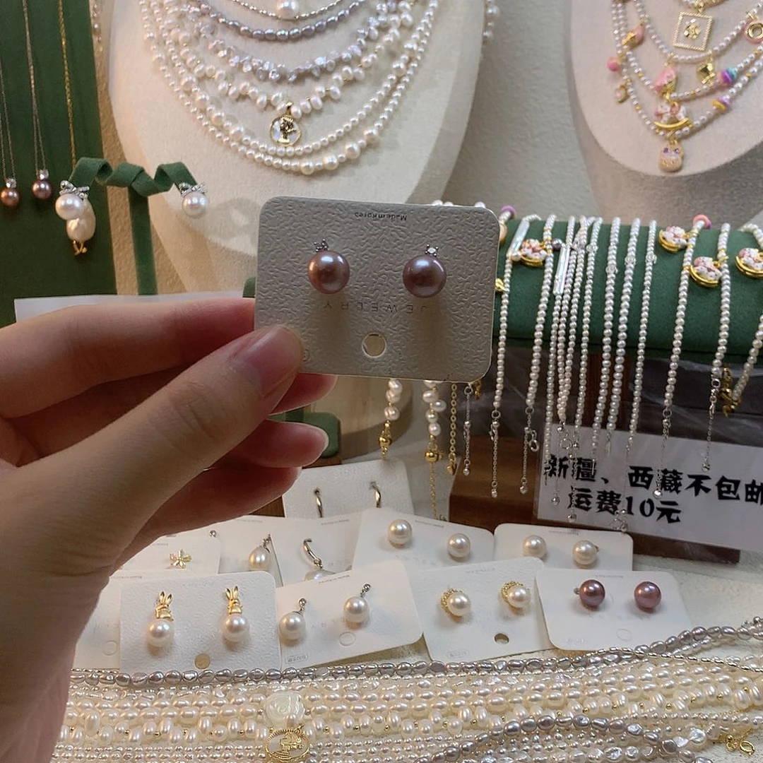 银S925镶嵌淡水珍珠紫色戴妃耳钉