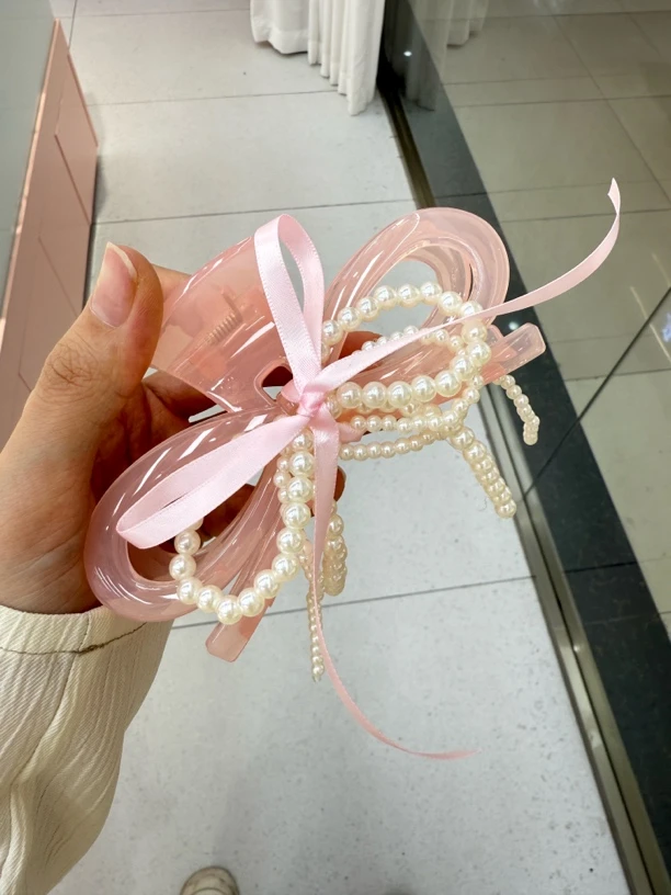 粉色珍珠蝴蝶结抓夹