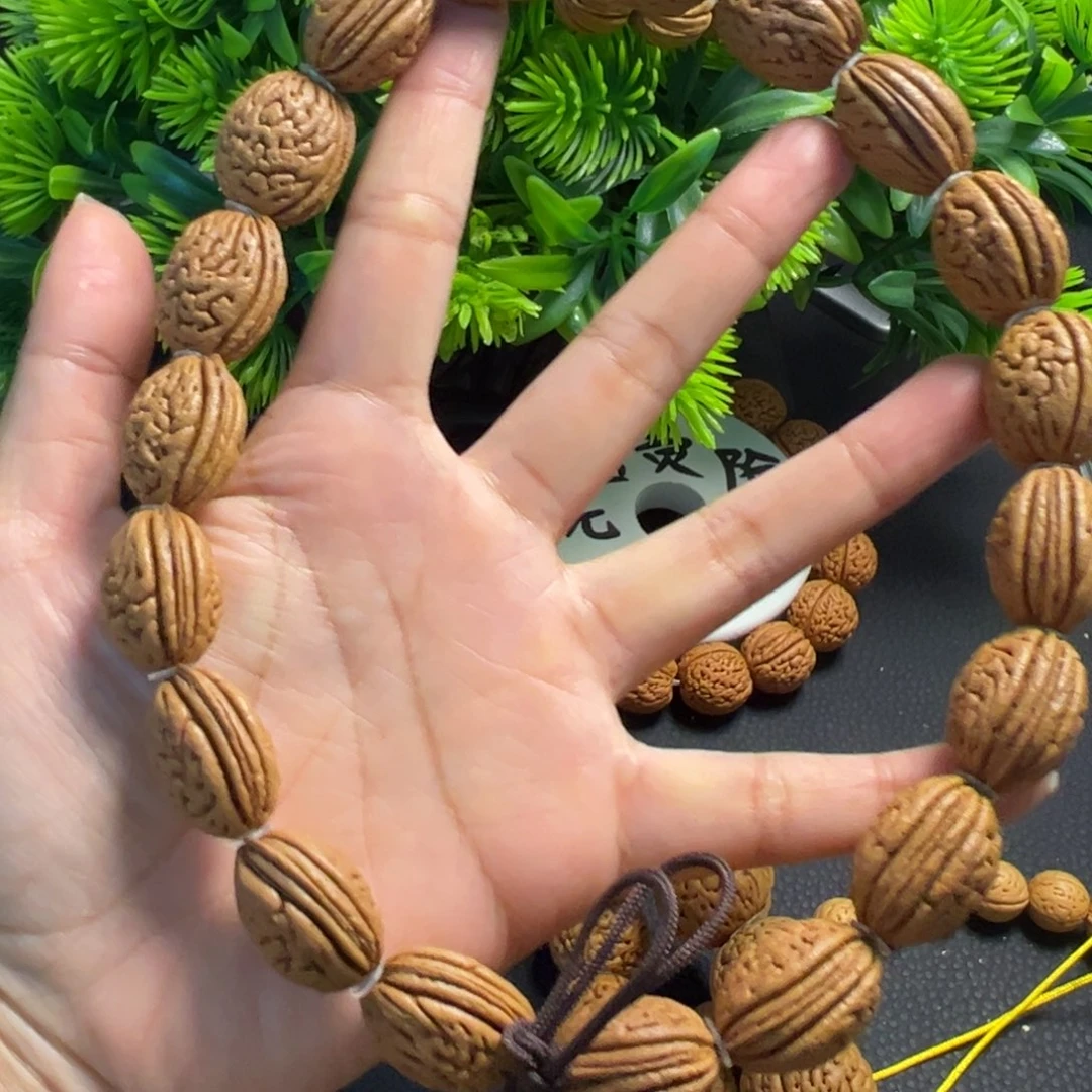 ****瓜无事牌桃木钱袋子手持