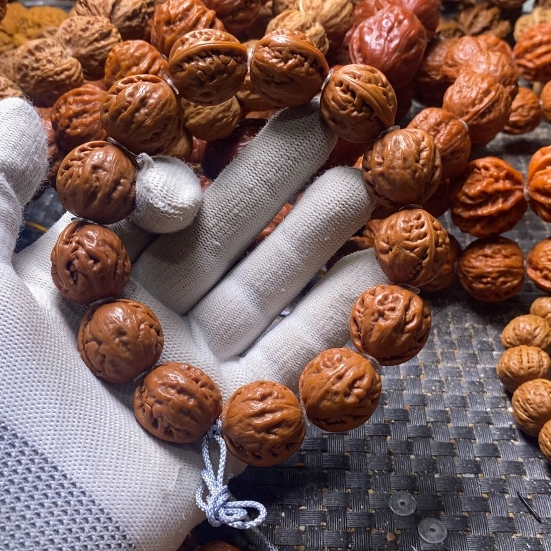 柚***脂文玩核桃吊坠粗筋