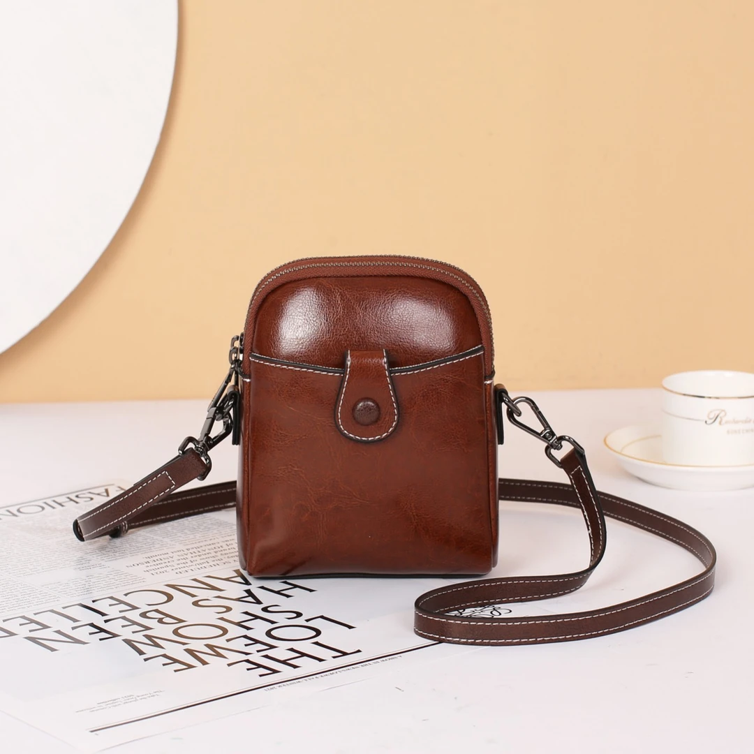 真牛皮手机包斜跨夏季休闲简约复古风中性简约款油蜡做旧防刮包