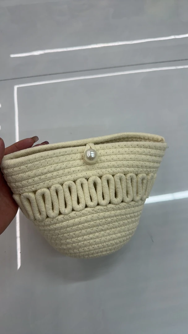 镂空编织度假风珍珠扣森系喇叭斜挎包