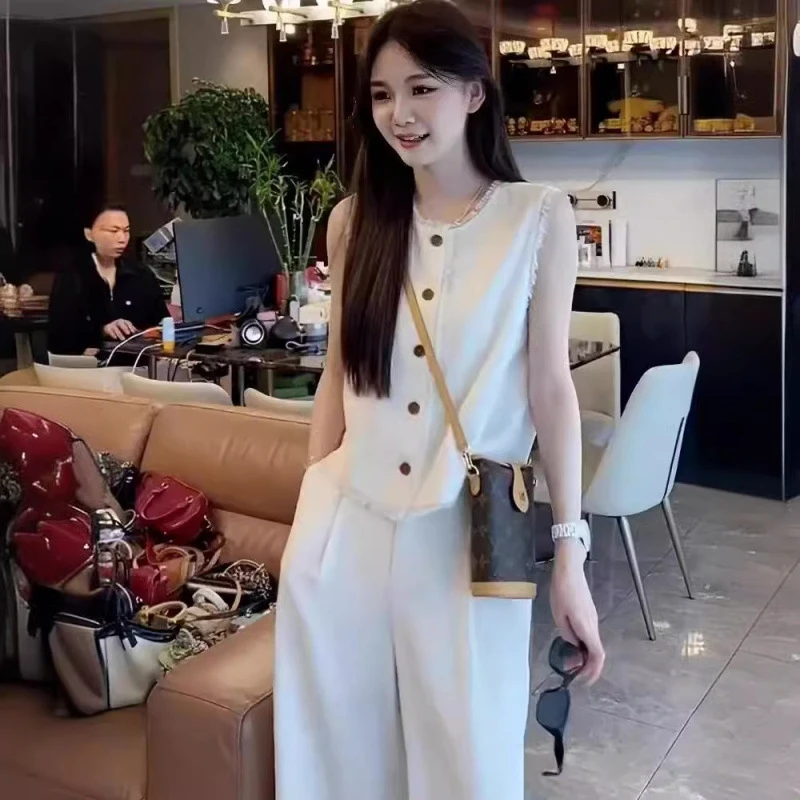 时尚小资背心亚麻马甲套装女2025春高级减龄气质流苏上衣长裤两件