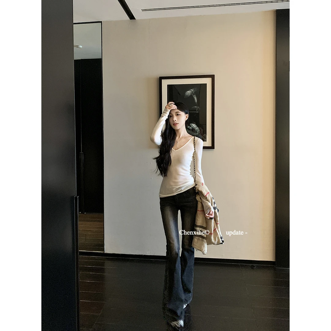 何晨曦 黑色复古修身显瘦微喇牛仔裤新款水洗做旧弹力裤子 T1166K