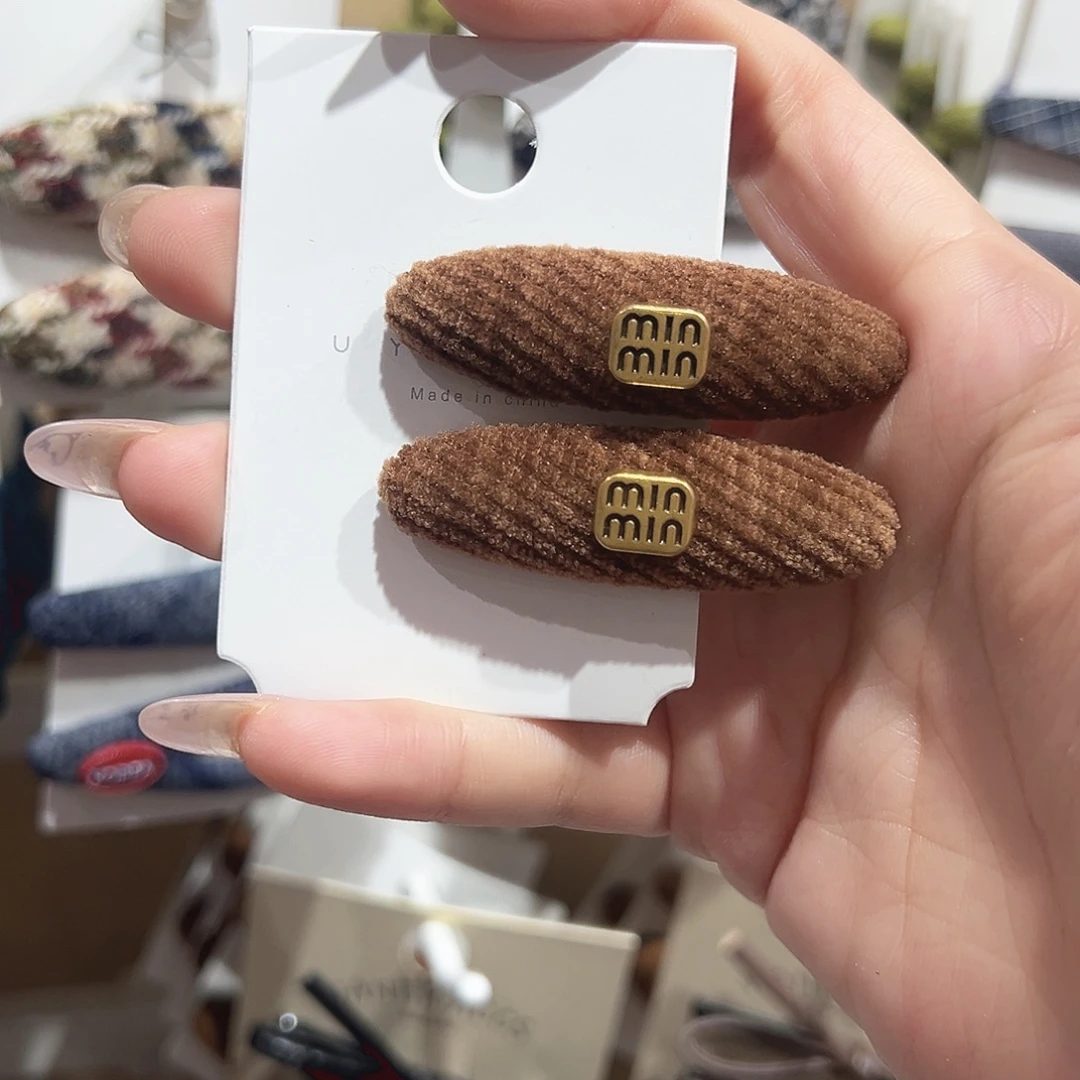 土***片皮质铁合金咖色椭圆鸭夹