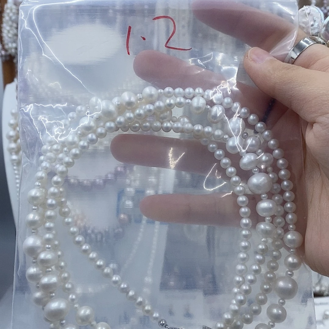 娇***l耳饰银S925镶嵌淡水珍珠