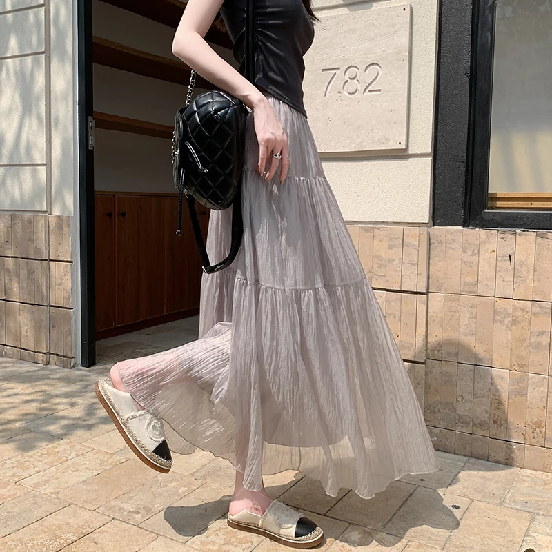 夏季轻盈飘逸裙摆仙气十足高腰设计微皱质感聚酯纤维A字半身中长