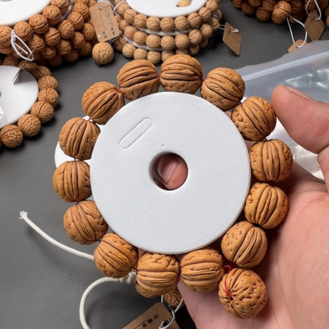 桃核手串小***。20盘锦肌肉纹