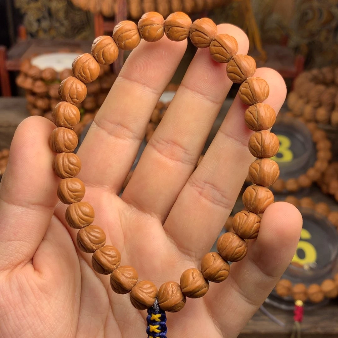 桃核吊坠轩****酒10树王水晶