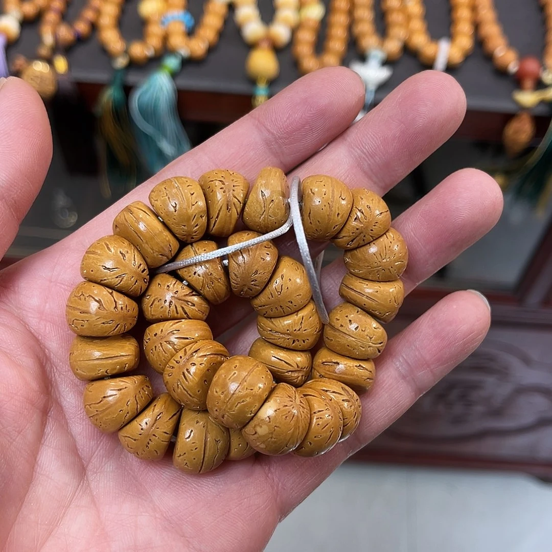沙***眼桃核手串纯天然桃核大肠手持