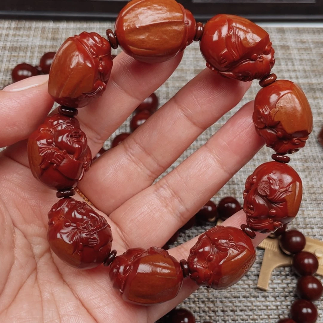 涛***4手串橄榄核包衣财神