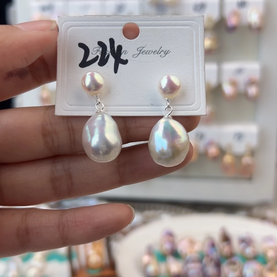 淡水珍珠耳饰银S925镶嵌三**?