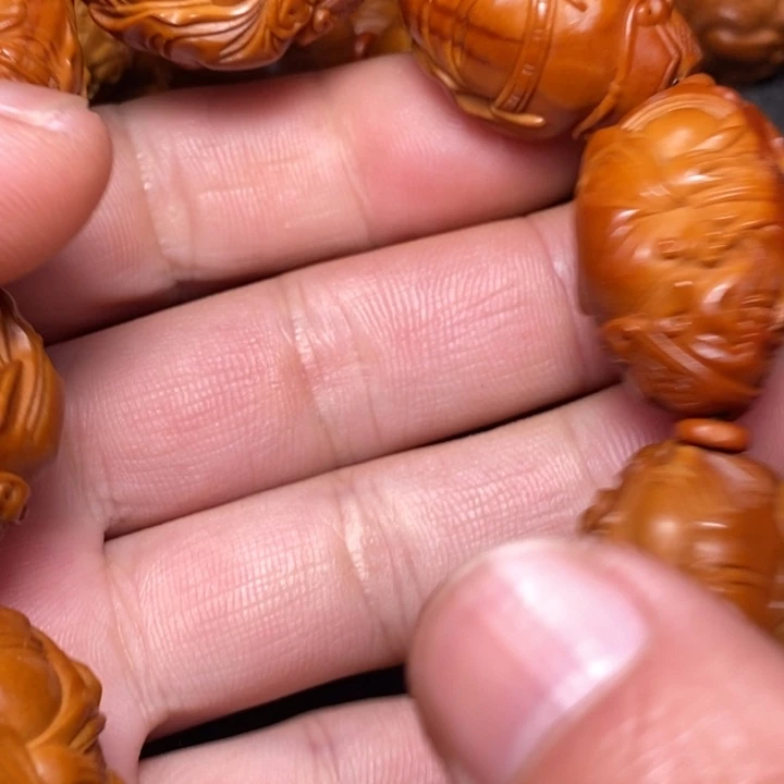 䲜***䲜橄榄核手串/手链纯手工雕刻八方来财