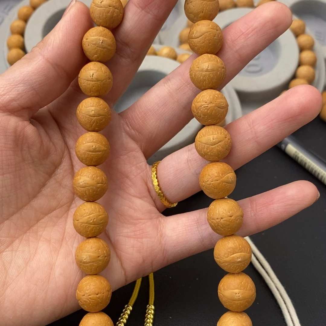 凤眼菩提吊坠12.5手持