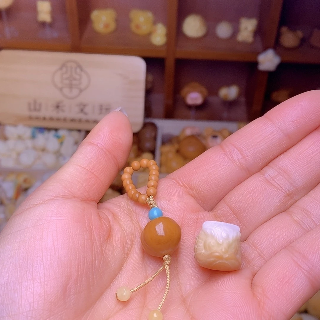 猴头核桃吊坠小屁桃提溜和炭烤醒狮