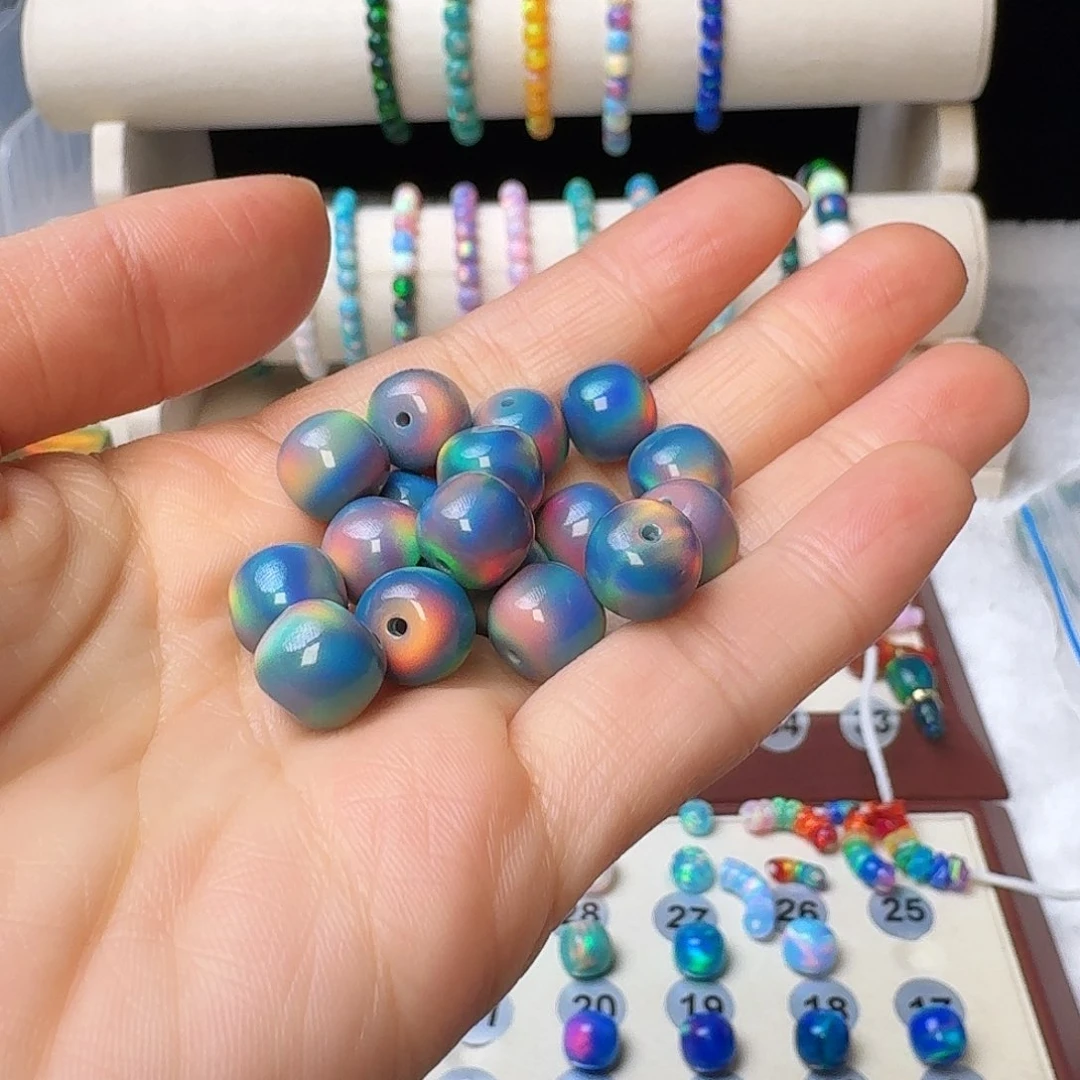 树脂制品衣**译人造欧泊卡10老型单圈手串海上夕阳20颗