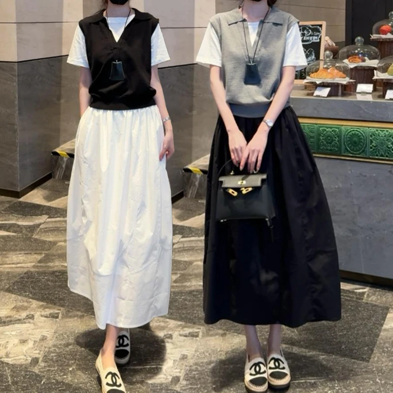 韩系高级慵懒纯色A字裙2025年春季新款小众设计黑色百搭半身裙子