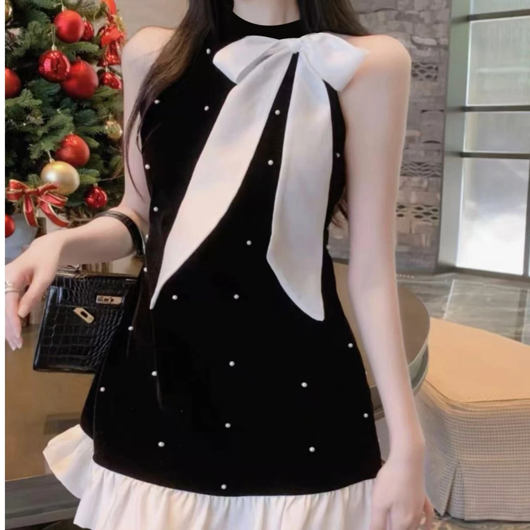 蝴蝶结挂脖吊带连衣裙2025春夏显瘦A字裙小众裙