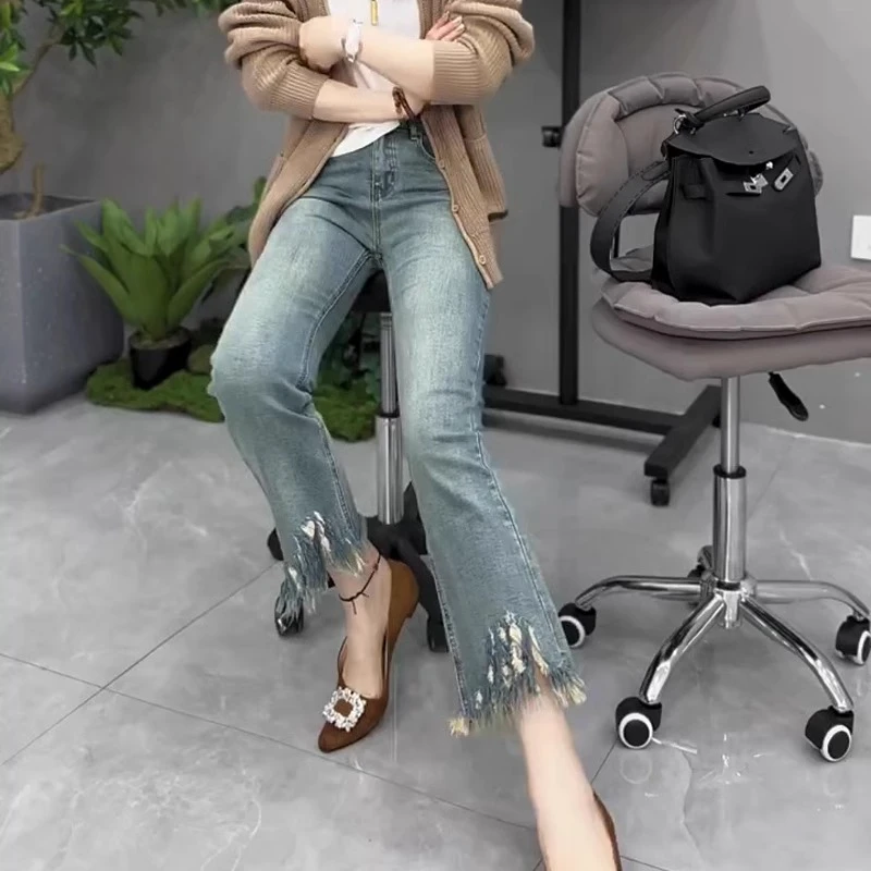 胖mm高腰弹力微喇叭牛仔裤女春秋新款大码宽松显瘦毛边九分直筒裤