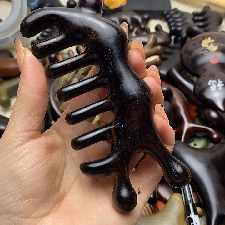 紫光檀大蜗牛按摩梳微瑕